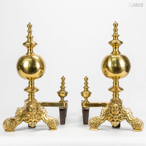 A pair of fireplace bucks / chenets made of bronze