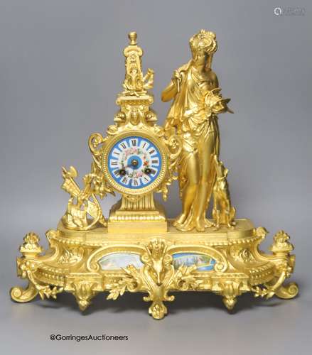 A late 19th century French gilt metal figural mantel clock, ...