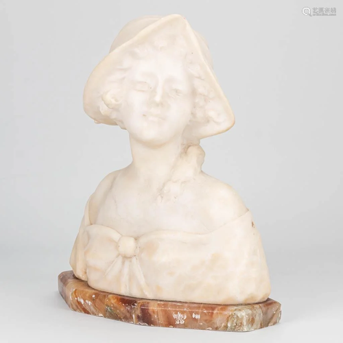 A bust made of alabaster in art deco style and marked