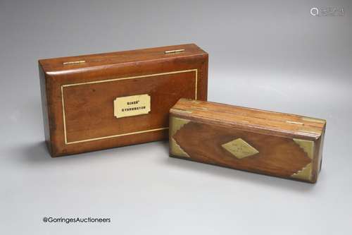 A Stanley, London spirit level, 1872 (cased) and a Sykes Hyd...