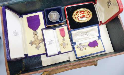 A cased OBE, a Knights silver gilt medal, miniatures, letter...