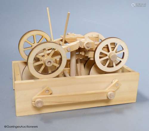 A modern lightwood mechanical model of a veteran motor car, ...