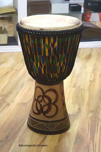 A Ghanian Djembe drum, height 62cm