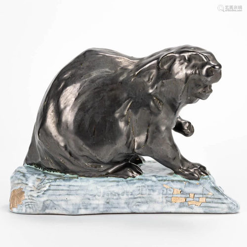 Josu‘ DUPON (1864-1935) a ceramic statue of an otter on