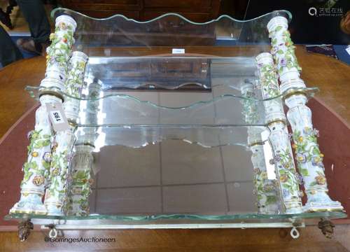 A German porcelain and glass three tier wall bracket, width ...