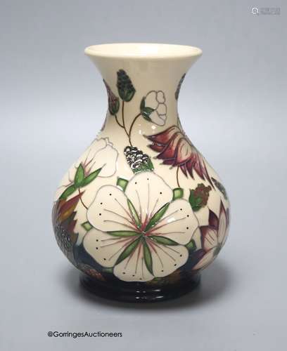 A Moorcroft vase in the Bramble Revisited design by Alicia A...