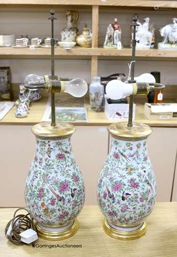 A pair of Chinese famille rose converted lamps, overall heig...