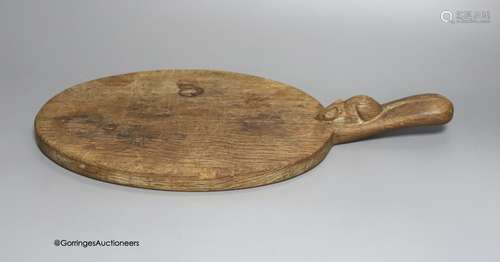 A Mouseman cheeseboard, length 38cm