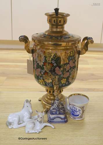 A Russian gilt samovar painted with flowers and a small coll...