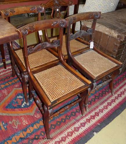 A part set of three Regency stained beech side chairs and an...