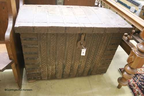 A 19th century Indian iron mounted domed top trunk, length 9...