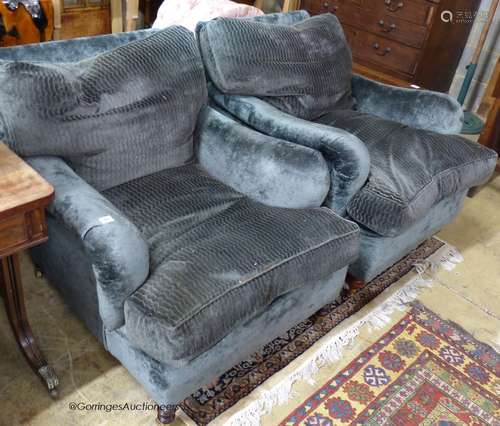 A pair of George Smith style upholstered armchairs