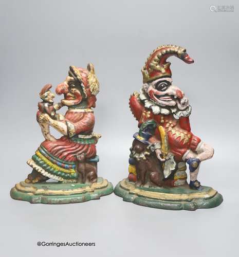 A pair of painted cast iron Punch and Judy door stops, heigh...