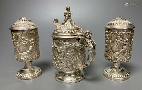 A three piece silver plated cruet set, by Elkington and co-,...