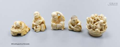 Five Japanese carved ivory netsukes, Meiji period, including...