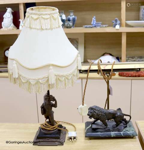 A spelter figural table lamp base and another lion student l...