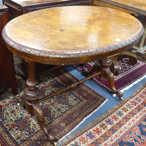 A Victorian oval tulip banded burr walnut centre table, widt...