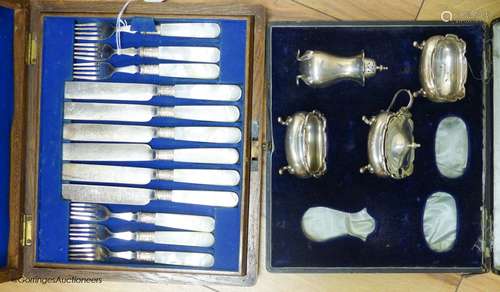 A cased part set of condiments and a cased set of plated fis...