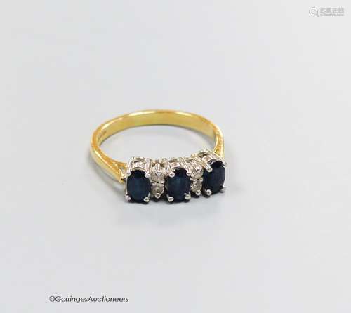 An 18ct gold sapphire and diamond dress ring, size N, gross ...