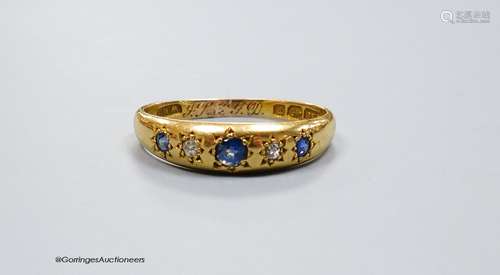 An 18ct gold sapphire and diamond 5-stone ring, size R, gros...