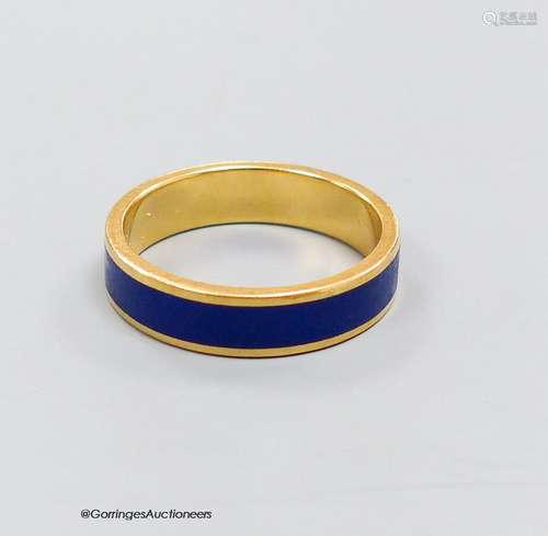 An 18ct. gold and blue enamel ring, size J, 3.9g.