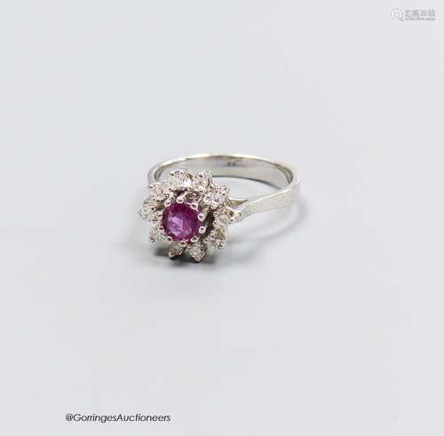 A 14k white gold pink sapphire and diamond cluster ring, siz...