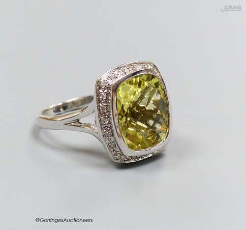 An 18ct white gold, diamond and lemon quartz cluster ring, s...