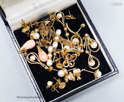 Twelve pairs of yellow metal earrings and two similar pendan...