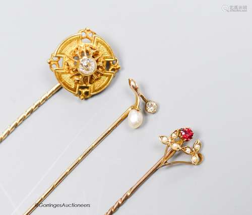 A Victorian diamond set gold target stickpin, another with p...