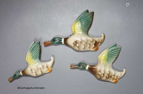 Three graduated pottery flying ducks, by Keele Street Potter...