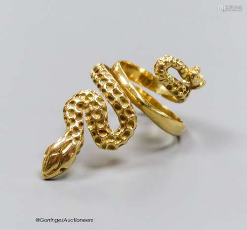 An 18ct gold (750) serpent ring, size F, 8.1g.