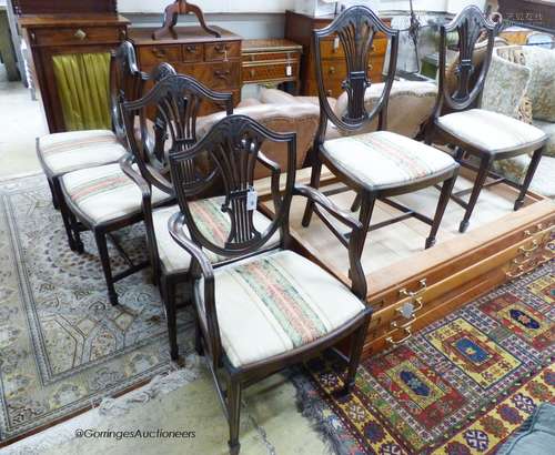 A set of six Hepplewhite style mahogany dining chairs, two w...