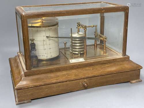 An Edwardian oak barograph retailed by Army & Navy stores lt...