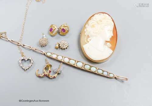 A gold and white opal bracelet (a.f), a cameo brooch and sun...