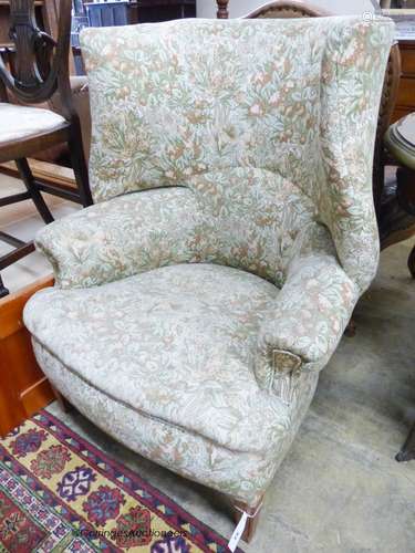 A George III upholstered tub framed wing armchair, width 80c...