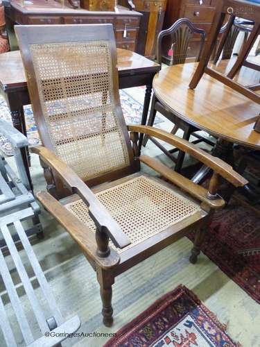 An early 20th century Colonial caned hardwood plantation cha...