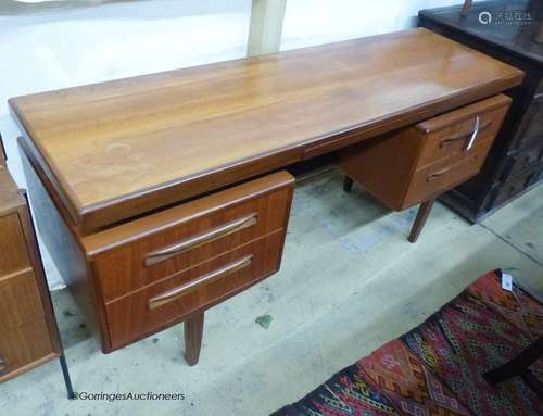 A mid century design G plan teak dressing table, length 152c...