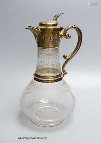 A Victorian silver mounted wheel engraved glass claret jug, ...