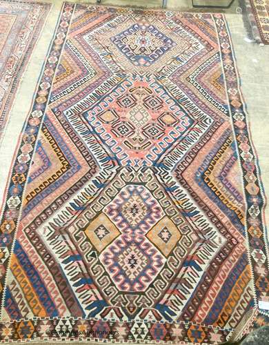 A Turkish kelim polychrome flatweave carpet, 278 x 155cm