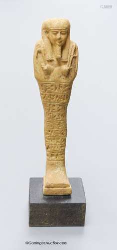 An Egyptian style ushabti, numbered 7501, height 18cm