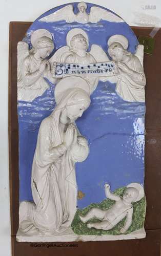 A Della Robbia style plaque of the Virgin and Child