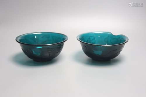 A pair of Chinese Beijing green glass bowls, Qianlong four c...