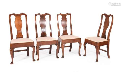 A CLOSELY MATCHED SET OF EIGHT GEORGE II 'RED WALNUT' DINING...