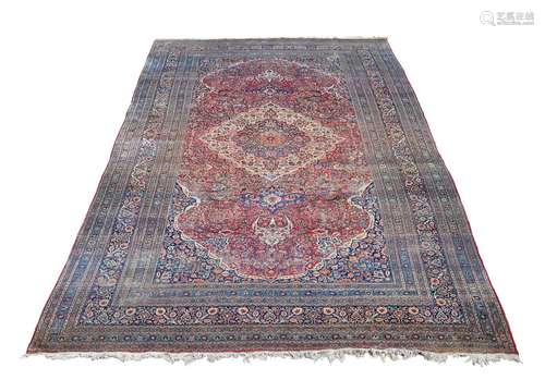 A LARGE TABRIZ CARPET, approximately 745 x 390cm