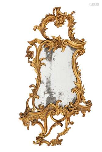 A CARVED GILTWOOD WALL MIRROR, IN GEORGE III STYLE, 19TH CEN...