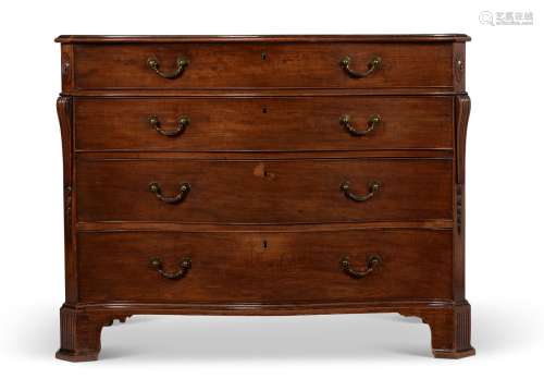 A GEORGE III MAHOGANY SERPENTINE FRONTED CHEST OF DRAWERS IN...