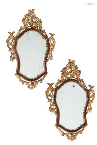 A PAIR OF ITALIAN GILTWOOD AND RED PAINTED WALL MIRRORS, CIR...