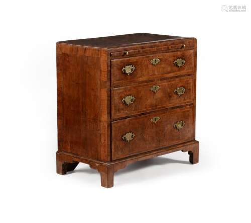 A GEORGE II WALNUT, FEATHER BANDED AND CROSS BANDED CHEST OF...