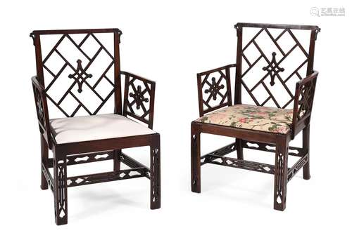 A PAIR OF GEORGE III MAHOGANY COCKPEN ARMCHAIRS IN THE CHINE...