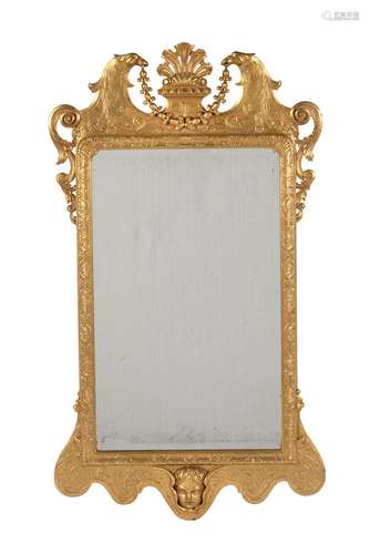 A GILTWOOD AND GESSO WALL MIRROR IN GEORGE II STYLE, 19TH OR...